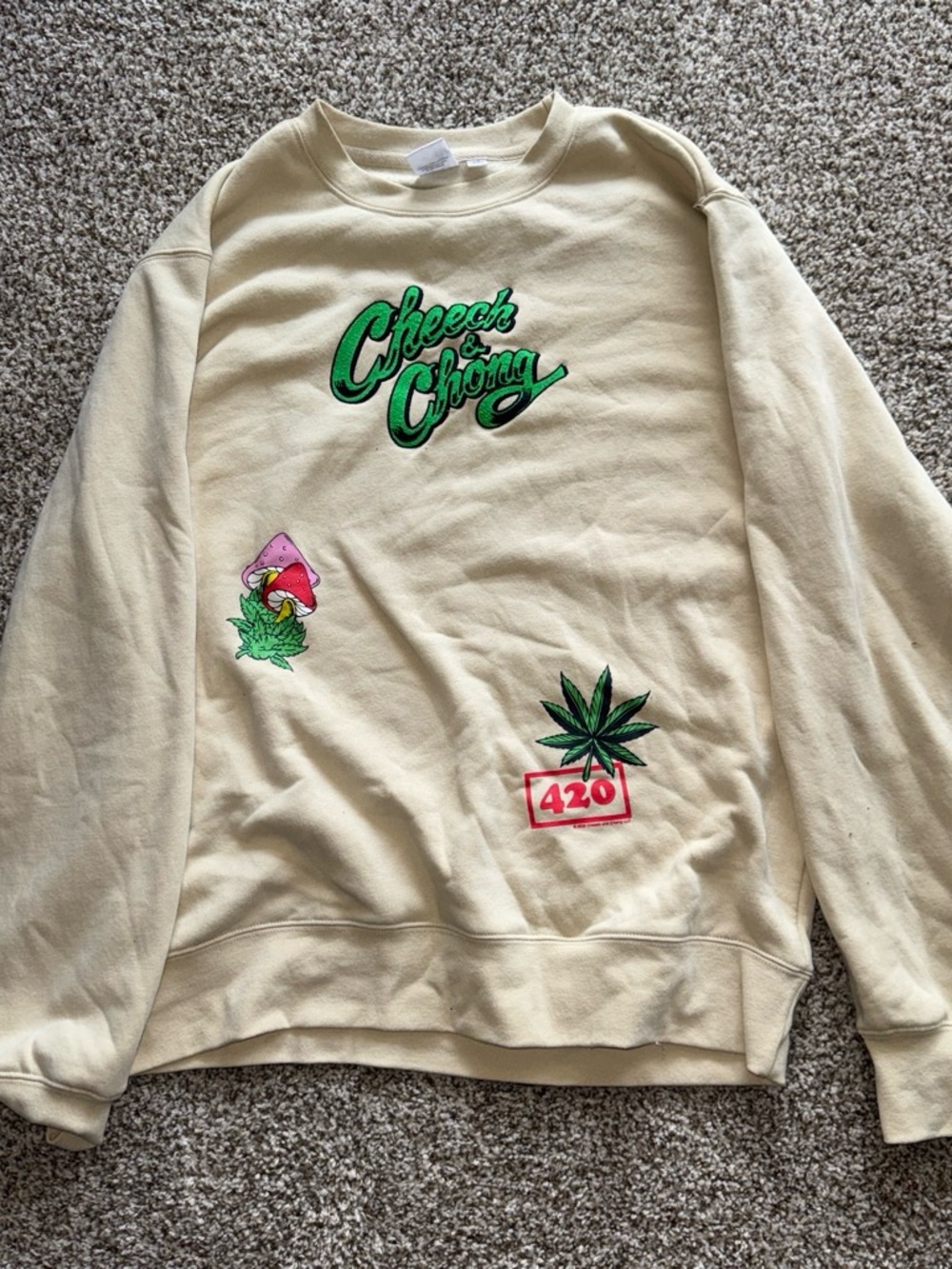 Cream Crewneck Sweatshirt with Green Graphic Logos